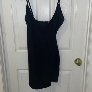 Tight mini black dress with cross front